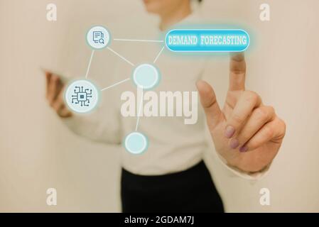 Hand writing sign Demand Forecasting. Internet Concept predict customer demand to optimize supply decisions Lady Holding Tablet Pressing On Virtual Stock Photo