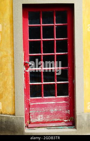Old red door in Paris Stock Photo