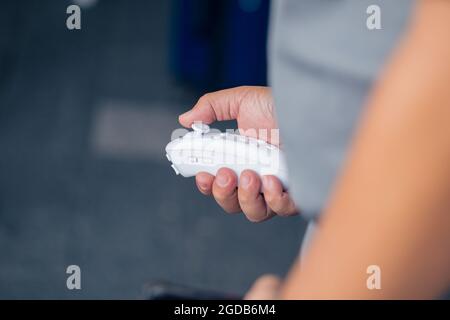 Wireless Joystick for gaming single hand controller with analog thumb multi direction control buttons. Stock Photo