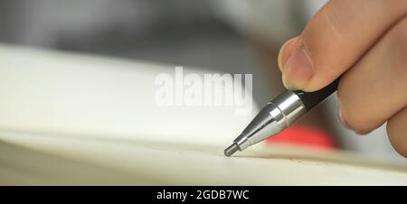 Hand hold pencils and draws or writing in notebook, artist hobby banner background with copy space Stock Photo