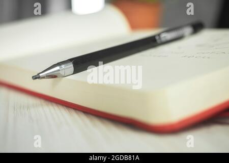Artist pencil sketch art supplies background photo , notebook and pencil on creative workspace Stock Photo