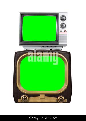 Two vintage television isolated on white with chroma green screen cut outs. Stock Photo
