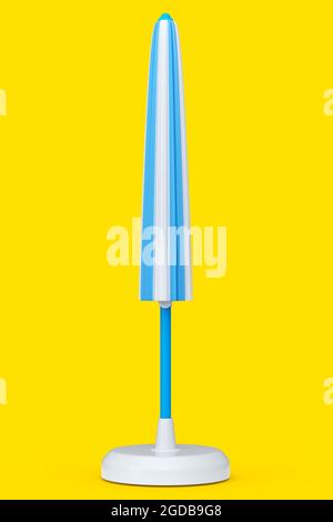 Blue striped beach umbrella for lounge zone on seashore isolated on yellow background. 3D rendering concept of vacation travel destination Stock Photo