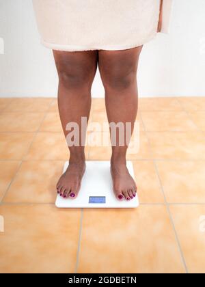 Overweight Fat Woman On The Weight Scale Stock Photo, Picture and Royalty  Free Image. Image 11259411.