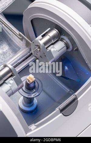 CAD CAM dental computer-aided machine. Digital modern dental laboratory ...