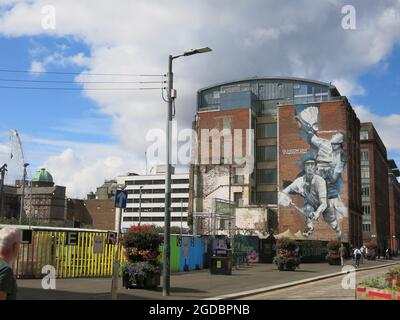 Street art used as part of a promotional campaign for the 2014 Commonwealth Games in Glasgow; this mural features Scottish badminton player Merrilees. Stock Photo