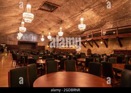 Krakow, Poland - August 29, 2018: Dining room with people around in the Wieliczka Salt Mine, Krakow, Poland Stock Photo