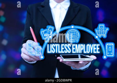 Text sign showing Listless Employee. Business concept an employee who having no energy and enthusiasm to work Lady In Uniform Holding Tablet In Hand Stock Photo