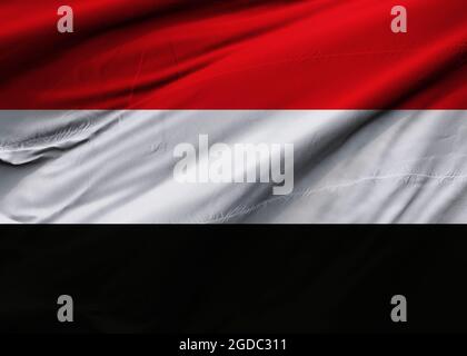 Republic of Yemen flag blowing in the wind. Background texture. Sana'a, Aden. 3d Illustration. 3d Render. Stock Photo