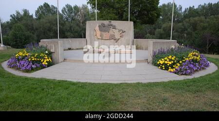 Monument with a map of Canada, flowers and a time capsule in Confederation Park. The park was created in 1967 to mark Canada's centennial. Stock Photo