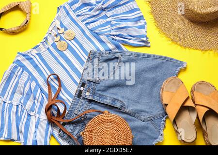 Composition with female clothes, shoes and accessories on color background, closeup Stock Photo