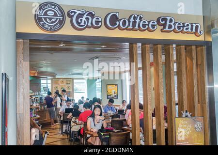 Singapore Bishan Place Junction 8 mall arcade,front entrance Asians The Coffee Bean cafe interior inside, Stock Photo