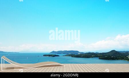 daybed on terrace in hotel or condominium with  island view and sea view - living area on balcony sea view - artwork for holiday time - Blur backgroun Stock Photo