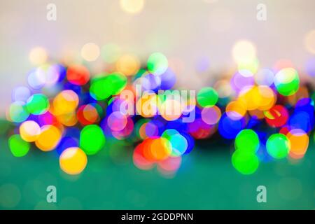 Blurred bokeh light background, Christmas and New Year holidays. Stock Photo