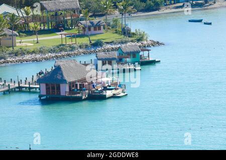 small houses in water in Amber Cove, Dominican Republic Stock Photo