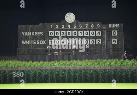 Dyersville, United States. 12th Aug, 2021. The manual scoreboard indicates the Chicago White Sox defeated the New York Yankees 9-8 during the MLB Field of Dreams Game in Dyersville, Iowa, Thursday, August 12, 2021. Photo by Pat Benic/UPI Credit: UPI/Alamy Live News