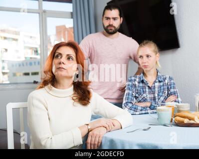 The son-in-law makes claims to the mother-in-law Stock Photo