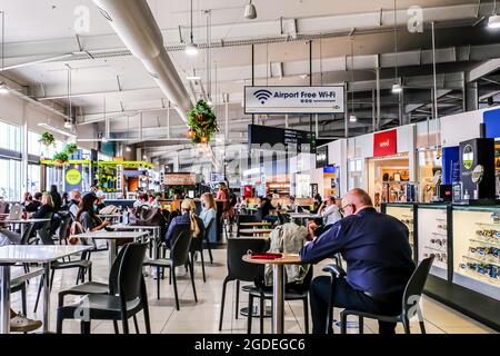 Gold Coast, Australia. 19th May, 2021. Travelers wait to depart at the Gold Coast, Coollangatta Airport waiting area. (Photo by Alexander Bogatyrev/SOPA Image/Sipa USA) Credit: Sipa USA/Alamy Live News Stock Photo