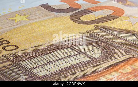 Macro close up on the design surface of 50 euro notes. Banknotes of the European Union. Wallpaper background of money. Detailed currency closeup. Euro Stock Photo