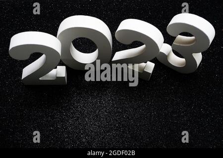 2023 Happy New Year with space copy on black glitter background Stock Photo