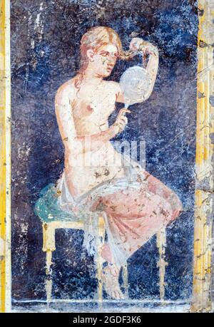 Woman brushing her hair fresco Stabiae, Villa Arianna 54-69 AD Stock Photo