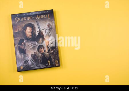 Lord of the rings motion pictures DVD isolated on a yellow background Stock Photo