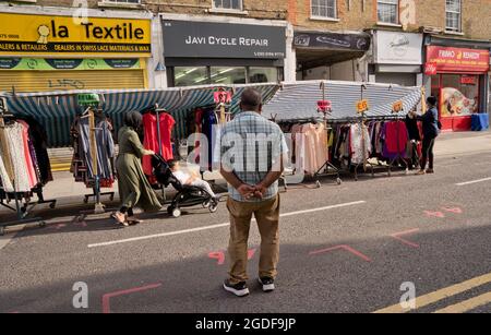 Street traders at Petticoat Lane market in London,England,UK Stock Photo