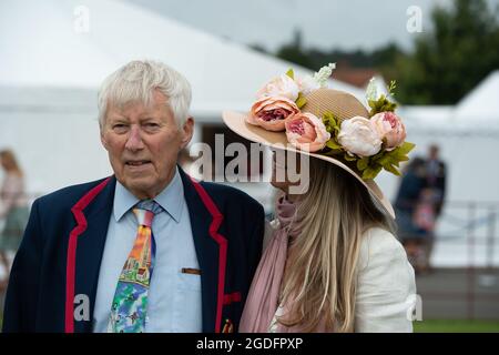 Henley-upon-Thames, Oxfordshire, UK. 13th Aug, 2021. Terence McGibbon rowed in final of the Visitors Cup 60 years ago at Henley Royal Regatta when he rowed for Chelsea College part of the University of London. He was at Henley toay with his proud daughter Kate Curtis. Credit: Maureen McLean/Alamy Live News Stock Photo