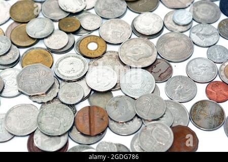 collection of different coins from multiple countries around the world ...