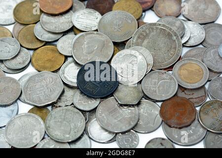 collection of different coins from multiple countries around the world ...