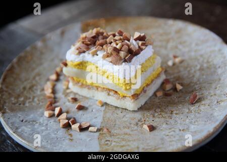 Mango cake with bean on wood background Stock Photo