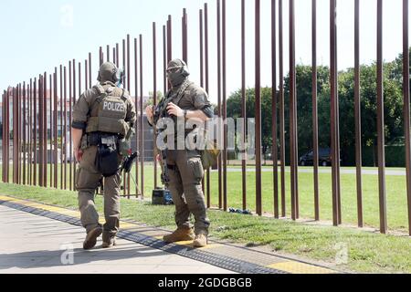 Berlin, Germany. 13th Aug, 2021. The central commemoration of the 60th anniversary of the construction of the Berlin Wall takes place on Bernauer Strasse under tightened security conditions. Credit: Wolfgang Kumm/dpa/Alamy Live News Stock Photo