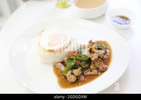 Local Thai food Stir fried pork with roasted sweet chili paste Stock Photo