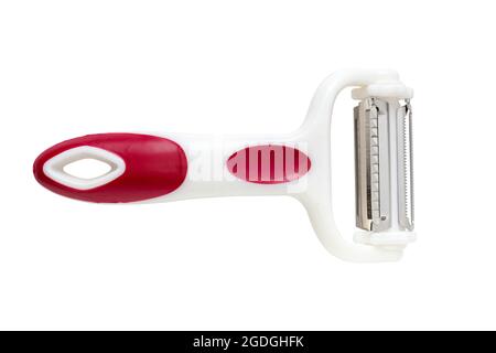 Universal, multifunctional fruit and vegetable peeler. Isolated on white background with clipping path, top view. Stock Photo