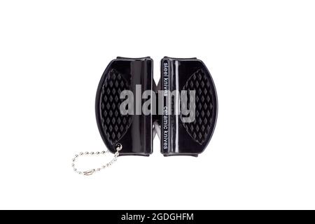 Universal knife sharpener for steel and ceramic knives, isolated on white background. with clipping path. Stock Photo