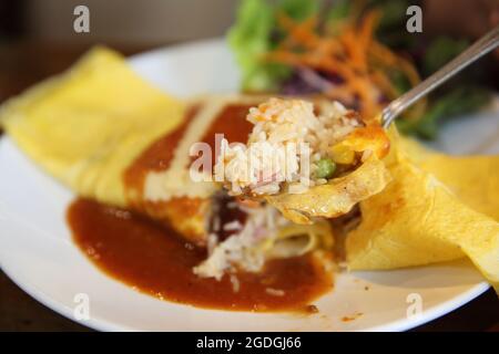 Flavored Fried Rice in an Omelet Wrapping Stock Photo