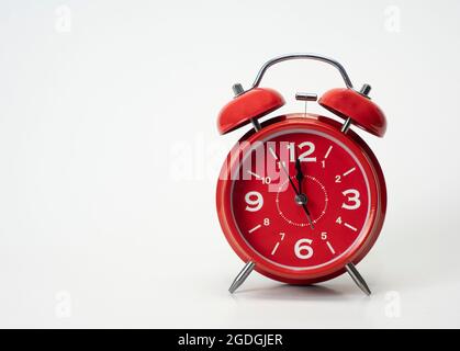 Red alarm clock isolated on white background, Copy space Stock Photo