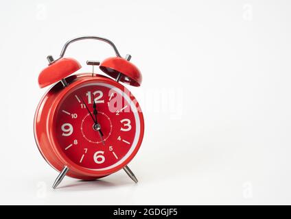 Red alarm clock isolated on white background, Copy space Stock Photo