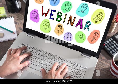 Webinar concept shown on a laptop screen Stock Photo