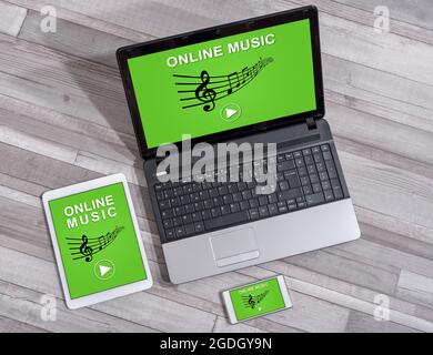 Online music concept shown on different information technology devices Stock Photo