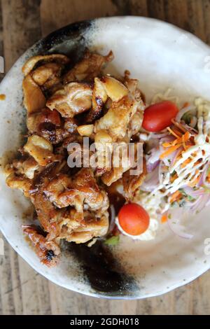 Grilled Chicken teriyaki on wood background Stock Photo