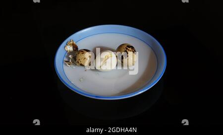 Boiled quail eggs on the plate Stock Photo