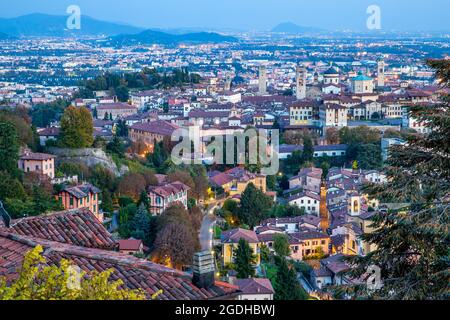 Panoramic view of the Old Town of Bergamo in Italy at dusk Stock Photo