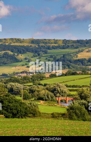 A view of Bredon HIll with Parson's Folly and Eckington Bridge, Cotswolds AONB, Worcestershire, England Stock Photo