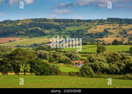 A view of Bredon HIll with Parson's Folly and Eckington Bridge, Cotswolds AONB, Worcestershire, England Stock Photo