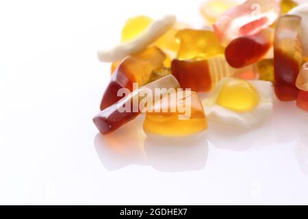 gummy candy with cola heart egg ring bear isolated in white background Stock Photo