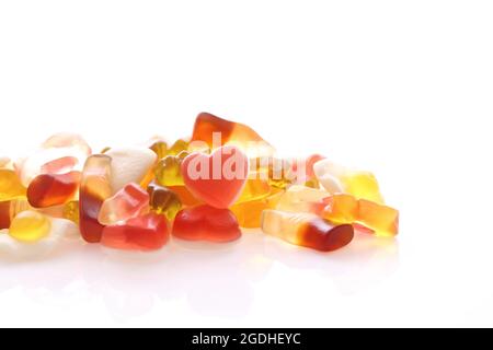 gummy candy with cola heart egg ring bear isolated in white background Stock Photo