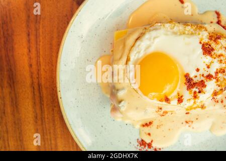 Two fried free range eggs on toast for breakfast with yellow yolks Stock Photo