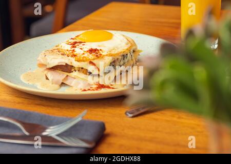 Two fried free range eggs on toast for breakfast with yellow yolks Stock Photo