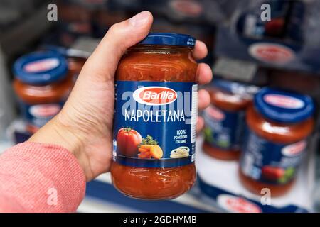 Tyumen, Russia-june 08, 2021: Sauce Barilla, the most famous pasta Italian brand. Buying products in a hypermarket Stock Photo